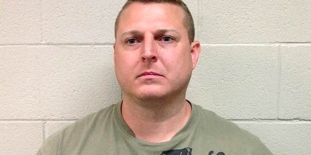 In this June 2016 photo released by the Hoke County (N.C.) Sheriff's Office, Thomas Russell Langford poses for a booking photograph.