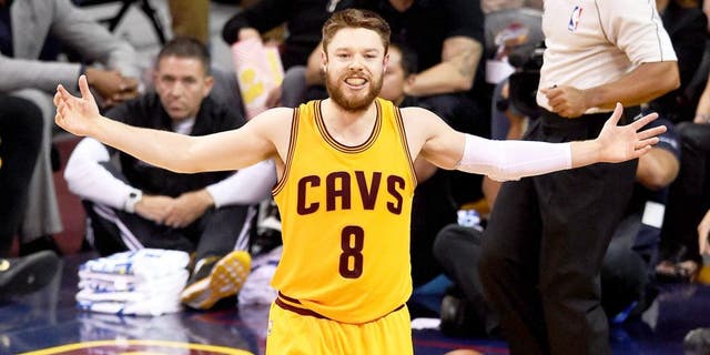 CLEVELAND, OH - JUNE 09: Matthew Dellavedova #8 of the Cleveland Cavaliers reacts against the Golden State Warriors during Game Three of the 2015 NBA Finals at Quicken Loans Arena on June 9, 2015 in Cleveland, Ohio. NOTE TO USER: User expressly acknowledges and agrees that, by downloading and or using this photograph, user is consenting to the terms and conditions of Getty Images License Agreement. (Photo by Jason Miller/Getty Images)