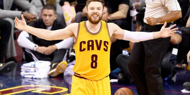CLEVELAND, OH - JUNE 09: Matthew Dellavedova #8 of the Cleveland Cavaliers reacts against the Golden State Warriors during Game Three of the 2015 NBA Finals at Quicken Loans Arena on June 9, 2015 in Cleveland, Ohio. NOTE TO USER: User expressly acknowledges and agrees that, by downloading and or using this photograph, user is consenting to the terms and conditions of Getty Images License Agreement. (Photo by Jason Miller/Getty Images)