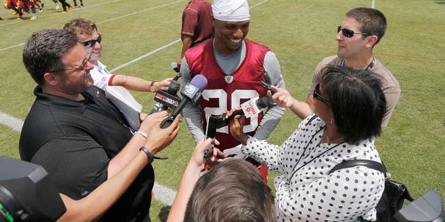 May 26, 2015; Ashbury, VA, USA; Washington Redskins cornerback Chris Culliver (29) speaks with the media after the Redskins OTA at Redskins Park. Mandatory Credit: Geoff Burke-USA TODAY Sports