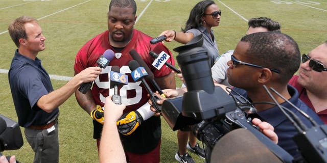 May 26, 2015; Ashbury, VA, USA; Washington Redskins nose tackle Terrance Knighton (98) speaks with the media after the Redskins OTA at Redskins Park. Mandatory Credit: Geoff Burke-USA TODAY Sports