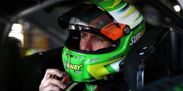 BROOKLYN, MI - JUNE 11: Carl Edwards, driver of the #19 Subway Toyota, sits in his car during practice for the NASCAR Sprint Cup Series FireKeepers Casino 400 at Michigan International Speedway on June 11, 2016 in Brooklyn, Michigan. (Photo by Rey Del Rio/Getty Images )