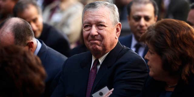 FILE -- In this Oct. 28, 2013 file photo, former U.S. Attorney General under President George W. Bush, John Ashcroft, attends the installation ceremony of James Comey as FBI director, in Washington.
