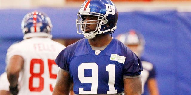 Jun 12, 2014; East Rutherford, NJ, USA; New York Giants defensive end Robert Ayers (91) during New York Giants minicamp at the Quest Diagnostics Training Center. William Perlman/The Star-Ledger-USA TODAY Sports