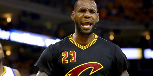 OAKLAND, CA - JUNE 13: LeBron James #23 of the Cleveland Cavaliers reacts against the Golden State Warriors during the second quarter in Game 5 of the 2016 NBA Finals at ORACLE Arena on June 13, 2016 in Oakland, California. NOTE TO USER: User expressly acknowledges and agrees that, by downloading and or using this photograph, User is consenting to the terms and conditions of the Getty Images License Agreement. (Photo by Ezra Shaw/Getty Images)