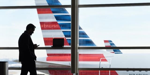 Emergency personnel in Minnesota were under fire Tuesday for their handling of a woman who was unresponsive in a bathroom on board an American Airlines flight