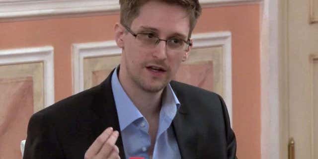 Oct. 11, 2013: Former National Security Agency systems analyst Edward Snowden speaks during a presentation ceremony for the Sam Adams Award in Moscow, Russia.