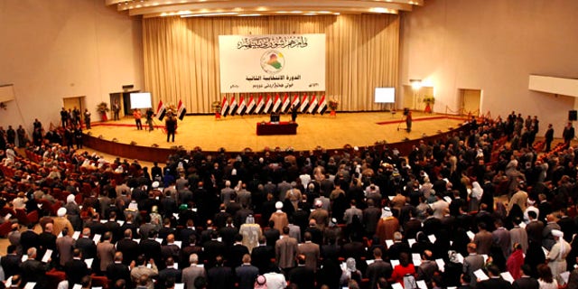 June 14: The members of the new Iraqi Parliament take the oath in the first session of Iraqi Parliament in Baghdad.