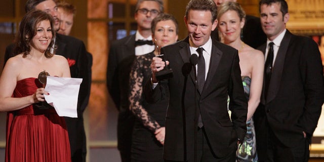 June 13: Author John Logan accepts the Tony Award for Best Play for "Red" during the 61st Tony Awards in New York.