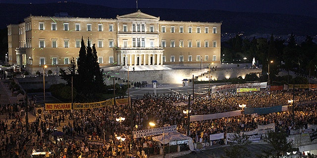 June 15: Demonstrators gather in front of the Parliament in Athens' main Syntagma square.