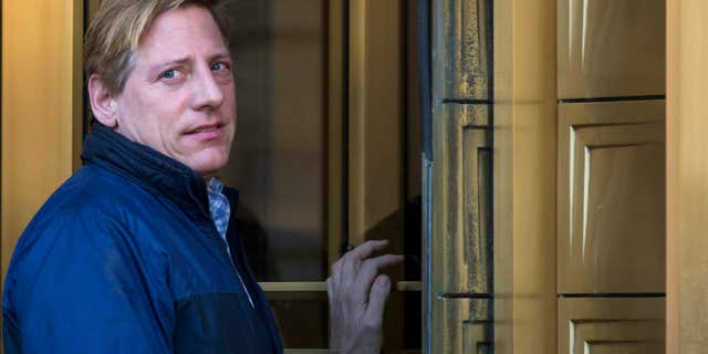 Feb. 20, 2014: Dana Giacchetto arrives at the Manhattan Federal Courthouse in New York.