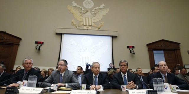 June 15: Oil company executives, (L-R) ExxonMobil Chairman and CEO Rex Tillerson, Chevron Chairman and CEO John Watson, ConocoPhillips Chairman and CEO James Mulva, Shell Oil Company President Marvin Odum and BP America Inc President and Chairman Lamar McKay testify on the BP oil spill in the Gulf of Mexico during a House Energy and Commerce hearing on Capitol Hill in Washington (Reuters).