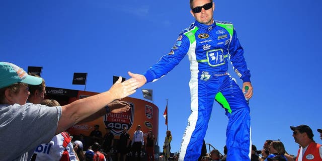 BROOKLYN, MI - JUNE 12: Ricky Stenhouse Jr, driver of the #17 Fifth Third Bank Ford, participates in pre-race ceremonies prior to the NASCAR Sprint Cup Series FireKeepers Casino 400 at Michigan International Speedway on June 12, 2016 in Brooklyn, Michigan. (Photo by Daniel Shirey/NASCAR via Getty Images)