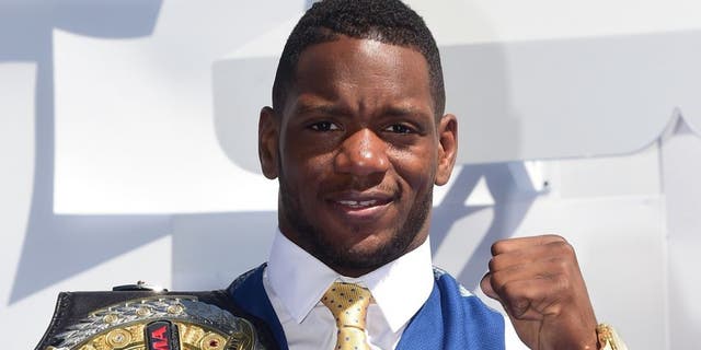 Mixed martial artist Will Brooks poses on arrival for the 2015 MTV Movie Awards on April 12, 2015 in Los Angeles, California. AFP PHOTO / FREDERIC J. BROWN (Photo credit should read FREDERIC J. BROWN/AFP/Getty Images)