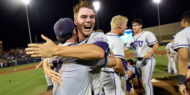 TCU's Connor Wanhanen, right, celebrates with teammate Josh Watson (7) after defeating Texas A&M 4-1 in a NCAA college baseball Super Regional tournament game, Sunday, June 12, 2016, in College Station, Texas. (AP Photo/Sam Craft)