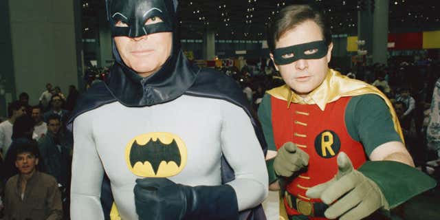 FILE - In this Jan. 27, 1989, file photo, actors Adam West, left, and Burt Ward, dressed as their characters Batman and Robin, pose for a photo at the "World of Wheels" custom car show in Chicago.