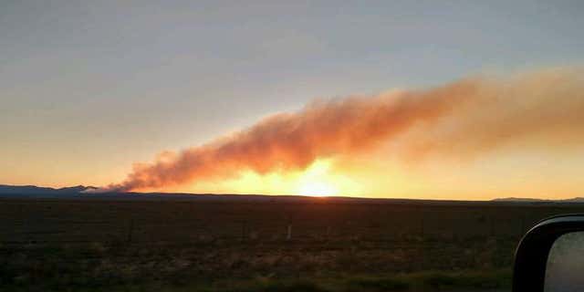 Photo shows wildfire burning in New Mexico in Manzano Mountains