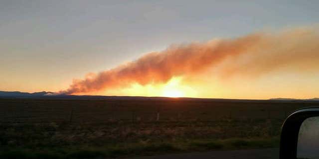 Photo shows wildfire burning in New Mexico in Manzano Mountains