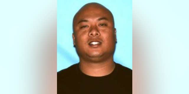 FILE - This undated file photo provided by the Honolulu Police Department shows Officer Jessie Laconsay.