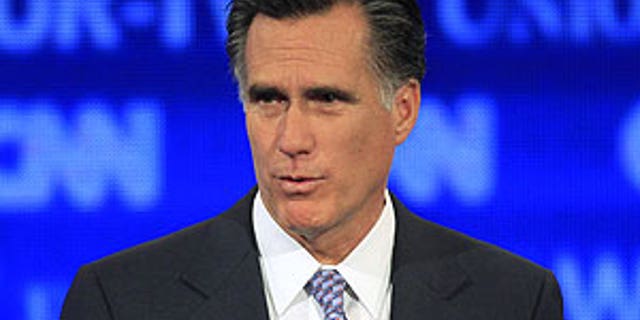 June 13: Former Massachusetts Gov. Mitt Romney answers a question during the first New Hampshire Republican presidential debate at St. Anselm College in Manchester, N.H.