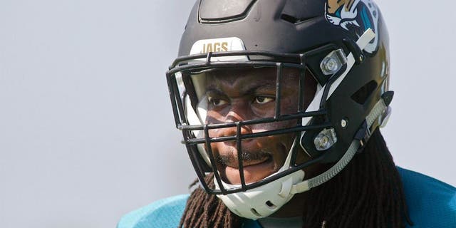 Jun 16, 2015; Jacksonville, FL, USA; Jacksonville Jaguars guard A.J. Cann (60) during minicamp at the Florida Blue Health and Wellness Practice Fields. Mandatory Credit: Phil Sears-USA TODAY Sports