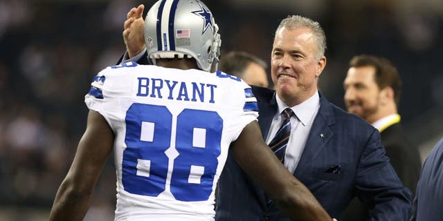 Dec 2, 2012; Arlington, TX, USA; Dallas Cowboys vice president Stephen Jones hugs receiver Dez Bryant (88) prior to the game against the Philadelphia Eagles at Cowboys Stadium. Mandatory Credit: Matthew Emmons-USA TODAY Sports