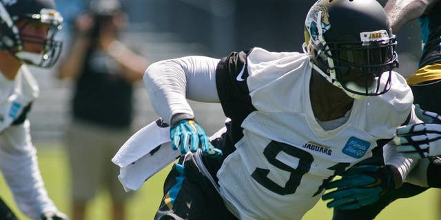 un 16, 2015; Jacksonville, FL, USA; Jacksonville Jaguars defensive end Chris Clemons (91) during minicamp at the Florida Blue Health and Wellness Practice Fields. Mandatory Credit: Phil Sears-USA TODAY Sports