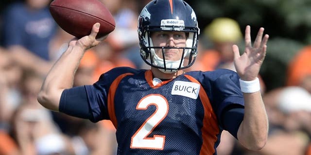 Jul 27, 2013; Englewood, CO, USA; Denver Broncos quarterback Zac Dysert (2) during training camp at the Broncos training facility. Mandatory Credit: Ron Chenoy-USA TODAY Sports