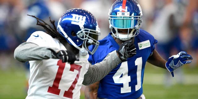 Jun 16, 2015; East Rutherford, NJ, USA; New York Giants cornerback Dominique Rodgers-Cromartie (41) defends wide receiver Dwayne Harris (17) during minicamp at Quest Diagnostics Training Center. Mandatory Credit: Steven Ryan-USA TODAY Sports