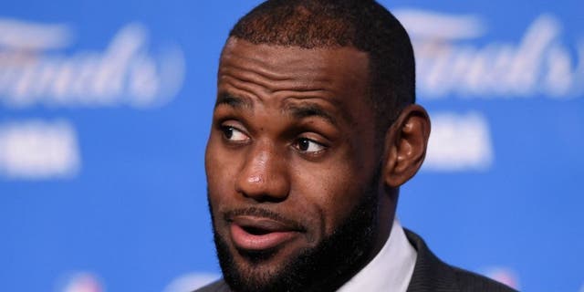 Jun 16, 2016; Cleveland, OH, USA; Cleveland Cavaliers forward LeBron James (23) speaks to the media after game six of the NBA Finals against the Golden State Warriors at Quicken Loans Arena. The Cavaliers won 115-101. Mandatory Credit: David Richard-USA TODAY Sports