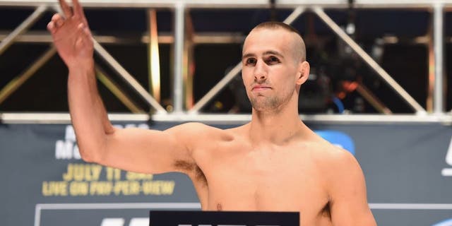 LAS VEGAS, NV - JULY 10: Rory MacDonald steps onto the scale during the UFC 189 weigh-in inside MGM Grand Garden Arena on July 10, 2015 in Las Vegas, Nevada. (Photo by Josh Hedges/Zuffa LLC/Zuffa LLC via Getty Images)