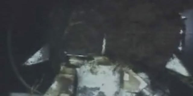 June 18: This image from video provided by BP PLC shows oil continuing to gush millions of gallons a day, from the broken wellhead, at the site of the Deepwater Horizon oil well in the Gulf of Mexico.