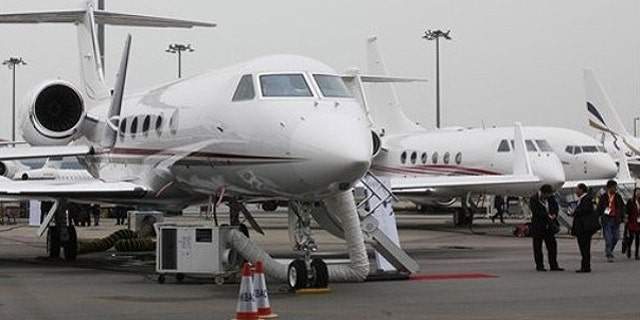 March 8: A Gulfstream G450 business jet, left, is displayed during the Asian Aerospace Show in Hong Kong .