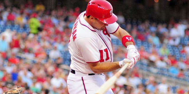 Jun 17, 2014; Washington, DC, USA; Washington Nationals outfielder Ryan Zimmerman (11) hits an RBI double in the third inning against the Houston Astros at Nationals Park. Mandatory Credit: Evan Habeeb-USA TODAY Sports