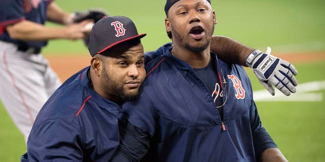 May 9, 2015; Toronto, Ontario, CAN; Boston Red Sox third baseman Pablo Sandoval (48) and Boston Red Sox left fielder Hanley Ramirez (13) during batting practice before a game against the Toronto Blue Jays at Rogers Centre. Mandatory Credit: Nick Turchiaro-USA TODAY Sports