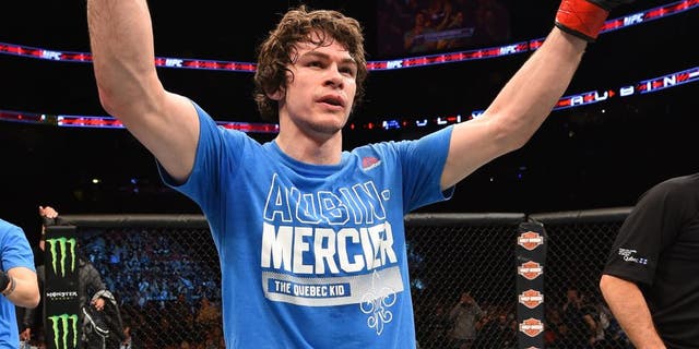 MONTREAL, QC - APRIL 25: Olivier Aubin-Mercier of Canada reacts after his submission victory over David Michaud of the United States in their lightweight bout during the UFC 186 event at the Bell Centre on April 25, 2015 in Montreal, Quebec, Canada. (Photo by Josh Hedges/Zuffa LLC/Zuffa LLC via Getty Images)