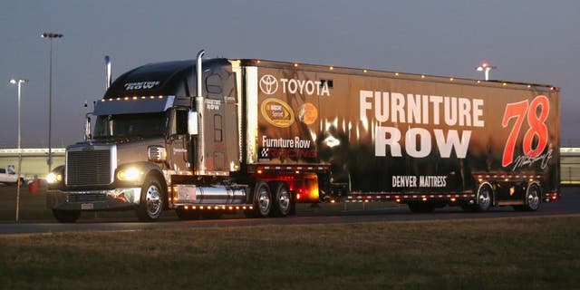 DAYTONA BEACH, FL - FEBRUARY 11: The hauler of Martin Truex Jr. (not pictured), driver of the #78 Furniture Row/Denver Mattress Toyota, arrives at Daytona International Speedway on February 11, 2016 in Daytona Beach, Florida. (Photo by Sarah Crabill/NASCAR via Getty Images)