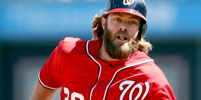 May 25, 2014; Pittsburgh, PA, USA; Washington Nationals right fielder Jayson Werth (28) runs from first to third base against the Pittsburgh Pirates during the seventh inning at PNC Park. The Nationals won 5-2. Mandatory Credit: Charles LeClaire-USA TODAY Sports
