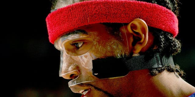 PHILADELPHIA - MAY 1: Richard Hamilton #32 of the Detroit Pistons is seen wearing his protective mask during Game four of the Eastern Conference Quarterfinals against the Philadelphia 76ers on May 1, 2005 at the Wachovia Center in Philadelphia, Pennsylvania. The Pistons won 97-92 in overtime. NOTE TO USER: User expressly acknowledges and agrees that, by downloading and or using this photograph, User is consenting to the terms and conditions of the Getty Images License Agreement. Mandatory Copyright Notice: Copyright 2005 NBAE (Photo by Jesse D. Garrabrant/NBAE via Getty Images)