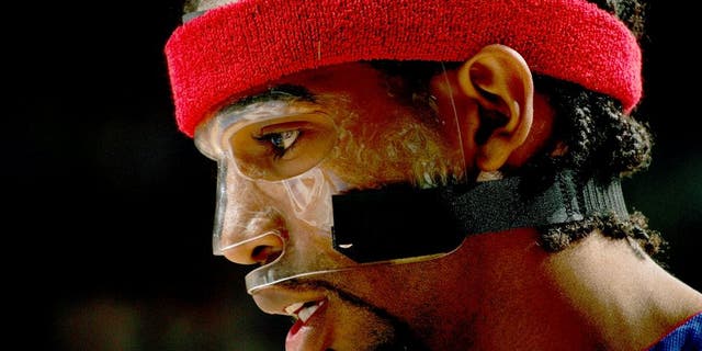 PHILADELPHIA - MAY 1: Richard Hamilton #32 of the Detroit Pistons is seen wearing his protective mask during Game four of the Eastern Conference Quarterfinals against the Philadelphia 76ers on May 1, 2005 at the Wachovia Center in Philadelphia, Pennsylvania. The Pistons won 97-92 in overtime. NOTE TO USER: User expressly acknowledges and agrees that, by downloading and or using this photograph, User is consenting to the terms and conditions of the Getty Images License Agreement. Mandatory Copyright Notice: Copyright 2005 NBAE (Photo by Jesse D. Garrabrant/NBAE via Getty Images)