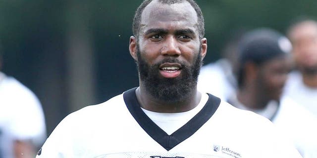 Jun 17, 2014; Philadelphia, PA, USA; Eagles safety Malcolm Jenkins (27) walks off the field at the conclusion of practice at mini camp at the Philadelphia Eagles NovaCare Complex. Mandatory Credit: Bill Streicher-USA TODAY Sports