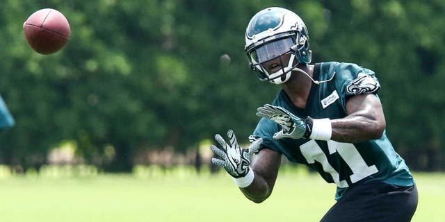 Jun 17, 2014; Philadelphia, PA, USA; Philadelphia Eagles wide receiver Josh Huff (11) catches the ball during mini camp at the Philadelphia Eagles NovaCare Complex. Mandatory Credit: Bill Streicher-USA TODAY Sports