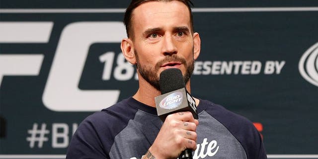 LAS VEGAS, NV - JANUARY 02: Phil "C.M. Punk" Brooks interacts with fans during a Q&A session before the UFC 182 weigh-in event at the MGM Grand Conference Center on January 2, 2015 in Las Vegas, Nevada. (Photo by Josh Hedges/Zuffa LLC/Zuffa LLC via Getty Images)