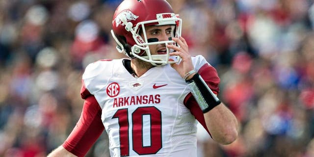 OXFORD, MISSISSIPPI - NOVEMBER 9: Brandon Allen #10 of the Arkansas Razorbacks on the field during a game against the Ole Miss Rebels at Vaught-Hemingway Stadium on November 9, 2013 in Oxford, Mississippi. The Rebels defeated the Razorbacks 34-24. (Photo by Wesley Hitt/Getty Images)