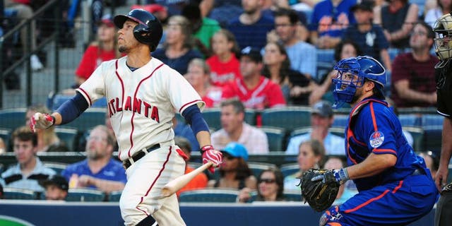 ATLANTA, GA - JUNE 20: Andrelton Simmons #19 of the Atlanta Braves knocks in a run with a second inning single against the New York Mets at Turner Field on June 20, 2015 in Atlanta, Georgia. (Photo by Scott Cunningham/Getty Images)