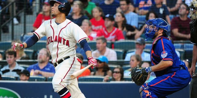 ATLANTA, GA - JUNE 20: Andrelton Simmons #19 of the Atlanta Braves knocks in a run with a second inning single against the New York Mets at Turner Field on June 20, 2015 in Atlanta, Georgia. (Photo by Scott Cunningham/Getty Images)