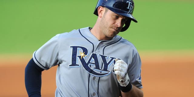 Jun 20, 2015; Cleveland, OH, USA; Tampa Bay Rays third baseman Evan Longoria (3) rounds the bases after hitting a three-run home run against the Cleveland Indians during the first inning at Progressive Field. Mandatory Credit: Ken Blaze-USA TODAY Sports