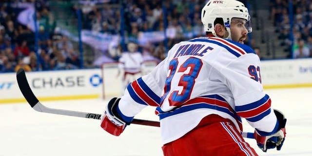 Nov 19, 2015; Tampa, FL, USA; New York Rangers defenseman Keith Yandle (93) skates against the Tampa Bay Lightning during the first period at Amalie Arena. Mandatory Credit: Kim Klement-USA TODAY Sports