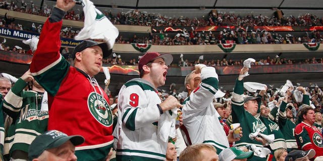 ST. PAUL, MN - APRIL 28: Minnesota Wild fans cheer on their team against the Colorado Avalanche during Game Six of the First Round of the 2014 Stanley Cup Playoffs on April 28, 2014 at the Xcel Energy Center in St. Paul, Minnesota. (Photo by Bruce Kluckhohn/NHLI via Getty Images)