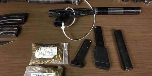 Weapons Christopher Goodine was allegedly carrying.